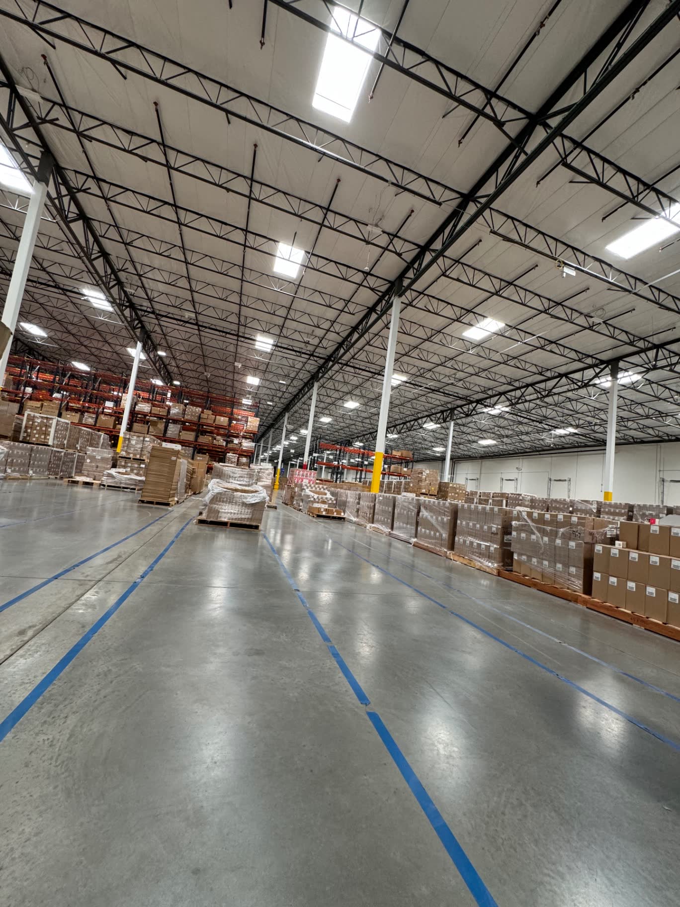 Large commercial warehouse floor maintained by Prestige of Nevada